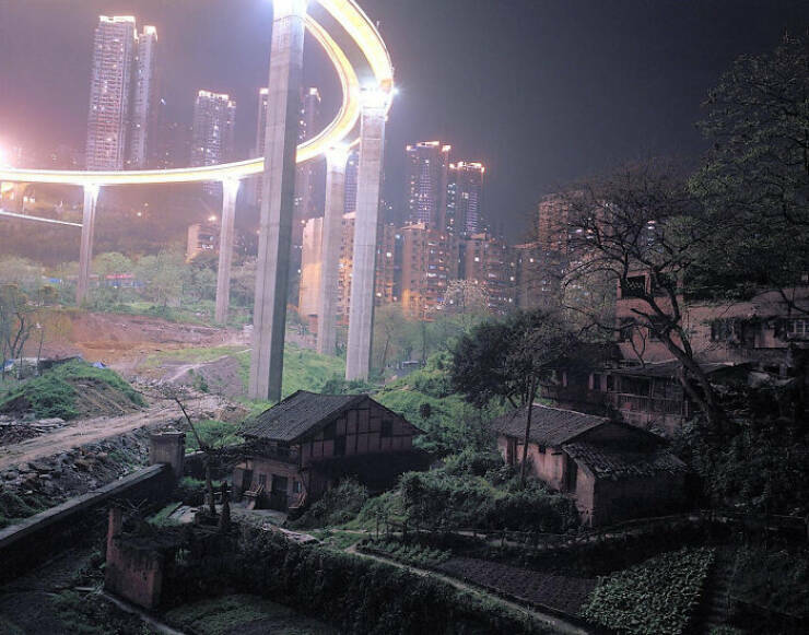 light_pollution_from_train_line_over_old_houses_in_china.jpg