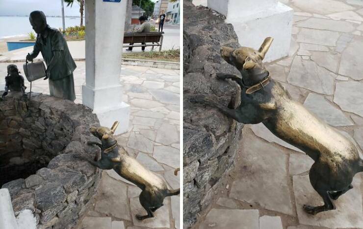 this_dog_statue_is_worn_down_from_being_petted_so_much.jpg